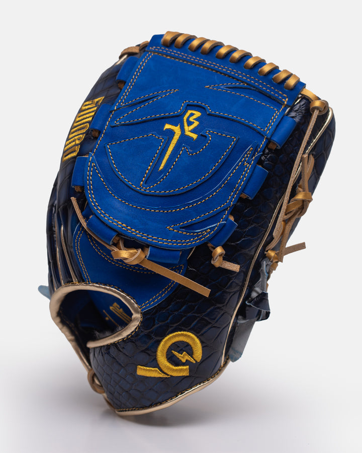 Blue and gold baseball glove on a white background