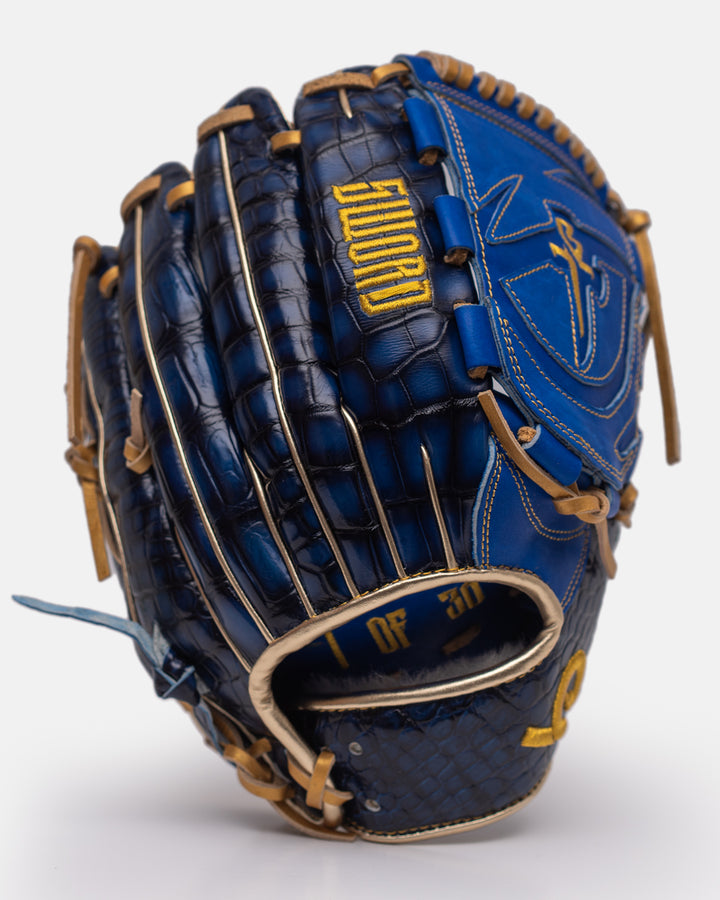 Blue and brown baseball glove with 'Wilson' branding on a white background
