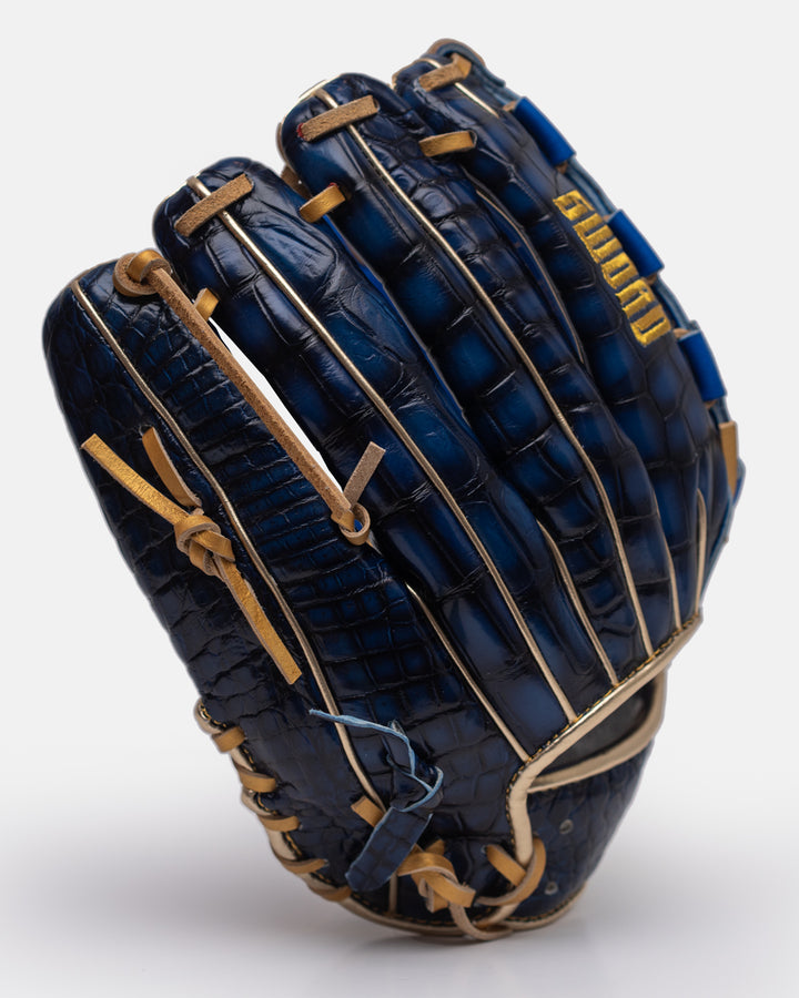 Blue baseball glove with brown laces on a white background