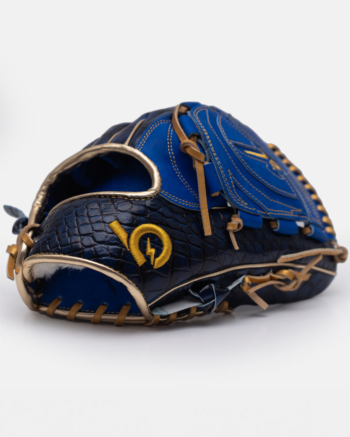 Blue and gold baseball glove on a white background