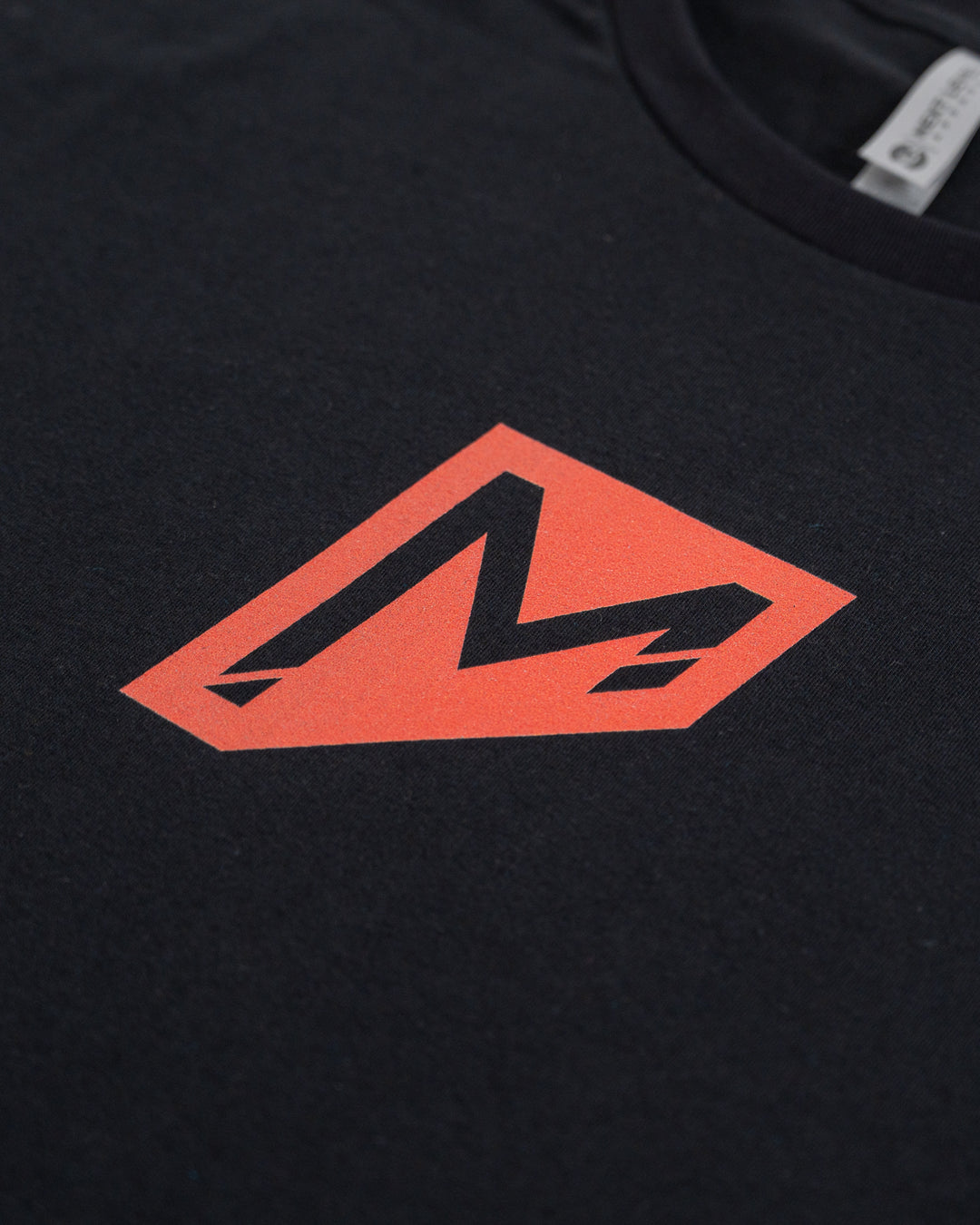 Momentum shield tee up close print quality