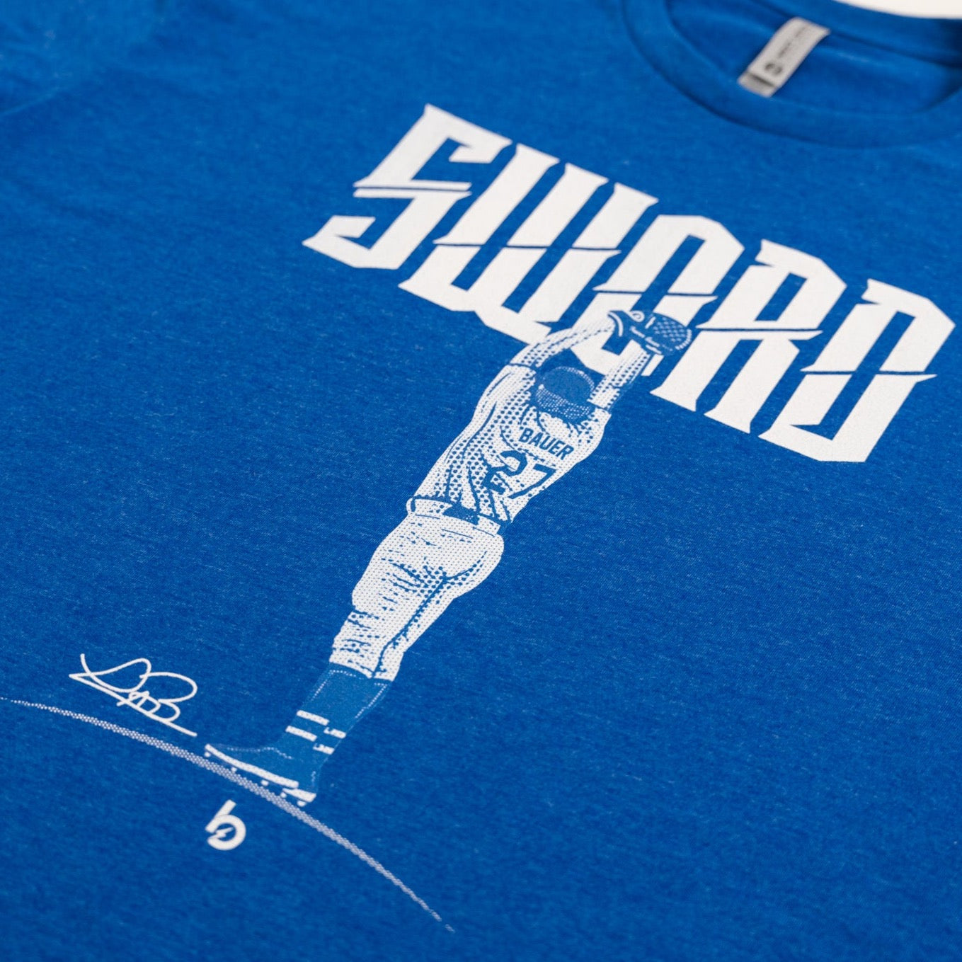 Trevor Bauer Outage sword tee logo up close